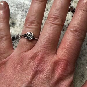 A 1 carat mossanite solitaire ring.